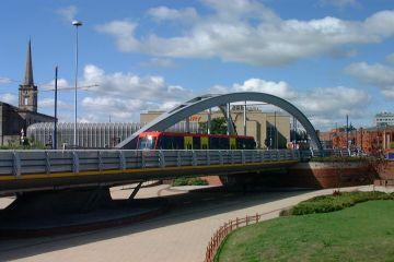Midland Metro running over the Wishbone Bridge in Wolverhampton
